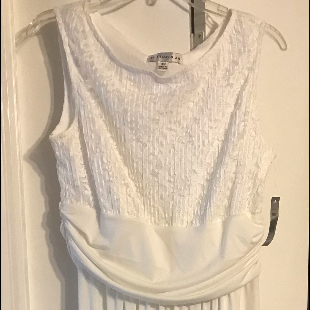 White lace layered waist bottom is dirty but never been worn.